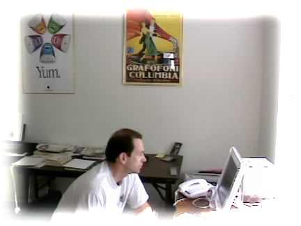 Steve working in Lisa's office