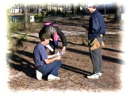 Lisa helping our builder, Randy, to read the plans.<br>