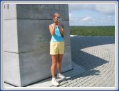 Lisa taking pictures at the Wright Brothers' Memorial