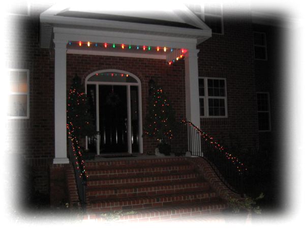 Lights and trees on the front porch