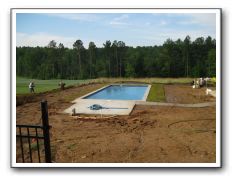 Pool lawn edges in place